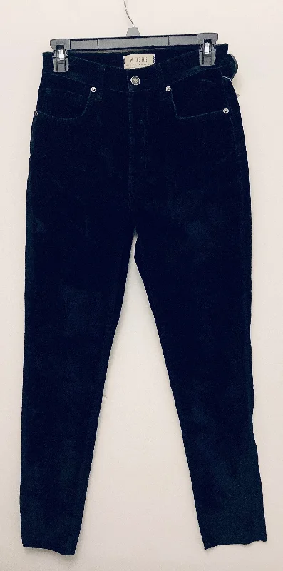 Stretch denim jeans with a high stretch factor for comfort and mobilityJeans Skinny By We The Free In Black Denim, Size: 2