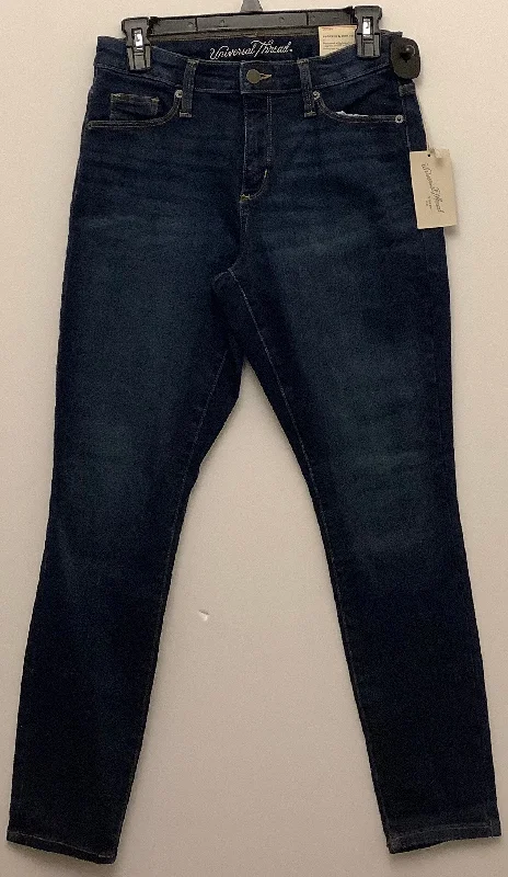 Jeans with a raw hem for an unfinished and rugged lookJeans Skinny By Universal Thread In Blue Denim, Size: 4