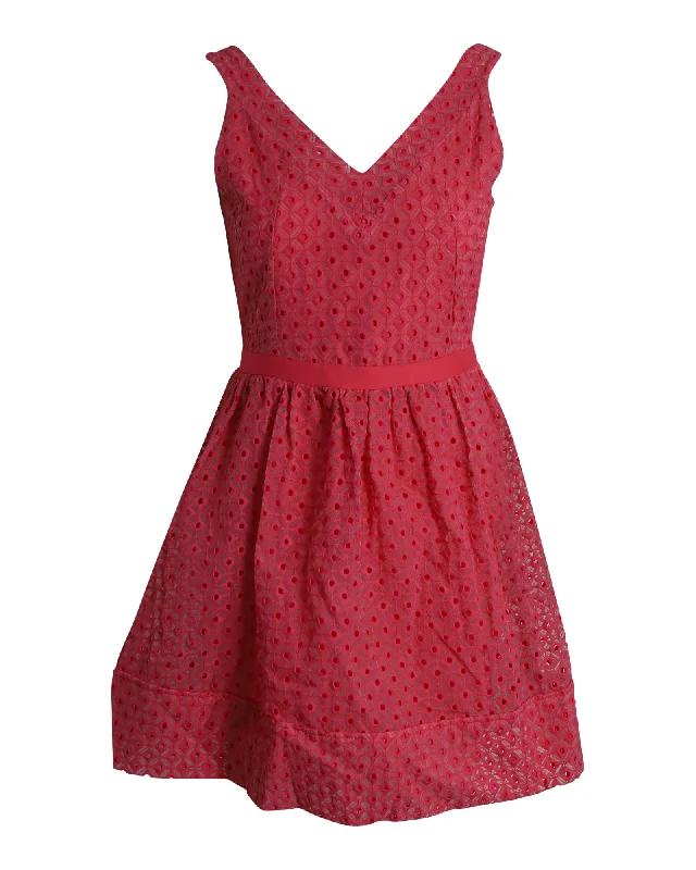 Statement dresses for making a fashion statementMaje Sleeveless Eyelet Mini Dress in Pink Cotton