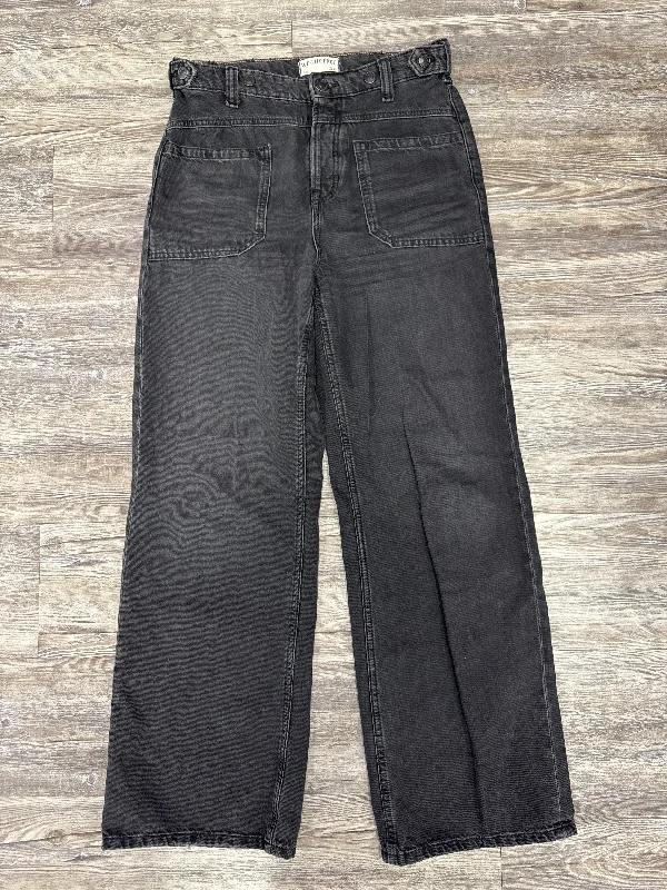 Jeans with a distressed and repaired patchwork design for character and individualityJeans Wide Leg By We The Free In Black, Size: 2