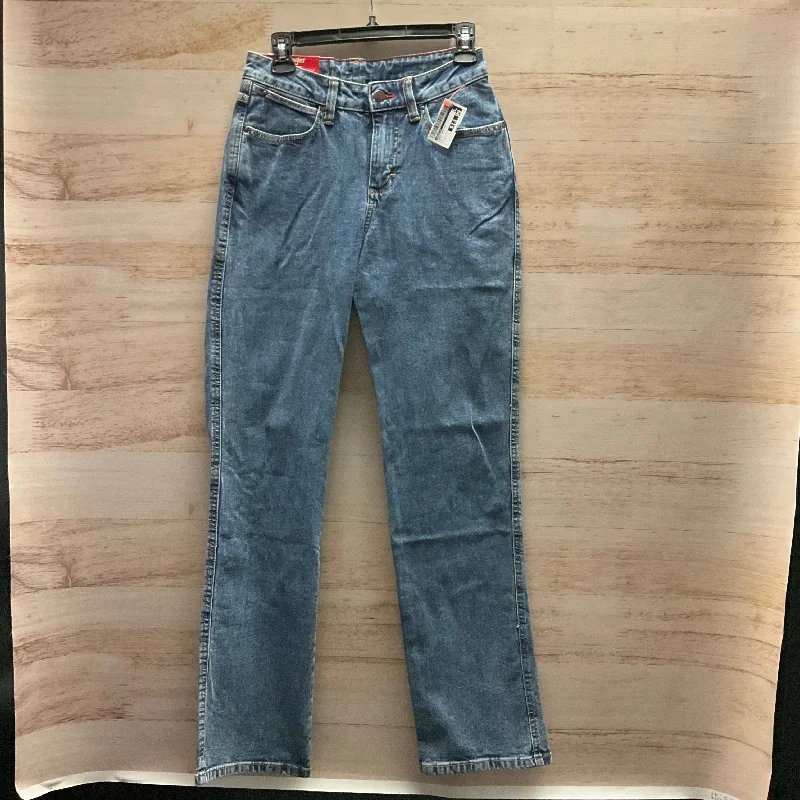 Skinny jeans with rips and tears for an edgy lookJeans Boot Cut By Wrangler In Blue, Size: 4