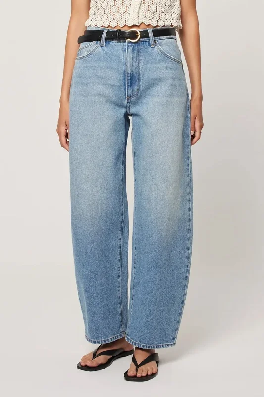 Jeans with a cropped length and rolled-up cuffs for a trendy lookRollas Jean - Gigi Barrel Jean, Brad Blue