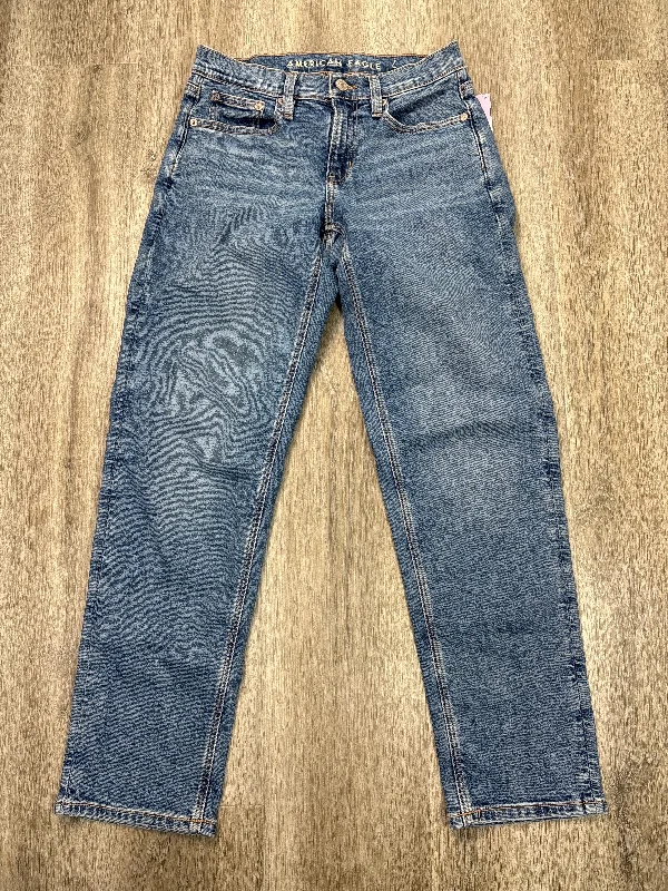 Ripped and repaired jeans for a rugged lookJeans Straight By American Eagle In Blue Denim, Size: 0