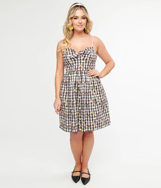 Transitional dresses for in-between seasonsHell Bunny 1950s Black & White Gingham & Fruit Cotton Swing Dress