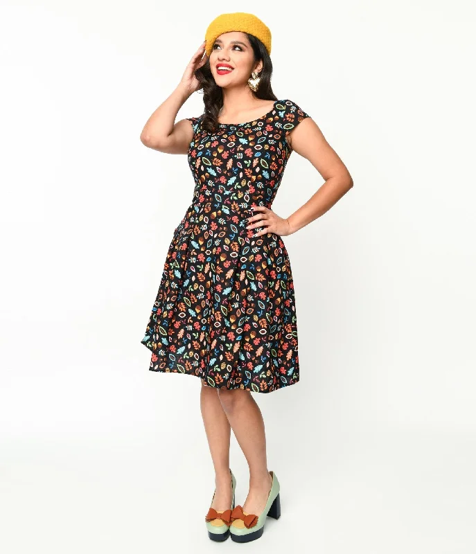 Transitional dresses for in-between seasonsRetrolicious Black Leaves & Acorns Margaret Flare Dress